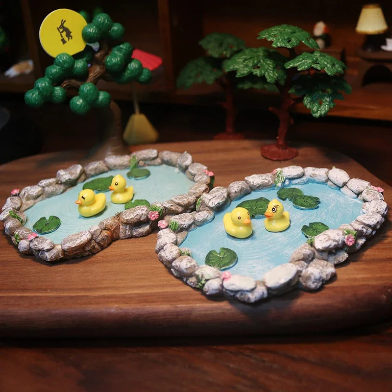 sculpture miniature artisanale arbres feuilles oiseaux balançoire pierres fleurs naturelextérieur jardin decoration résine