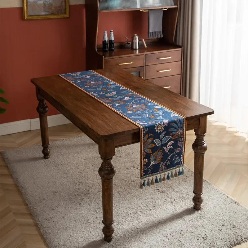 nappe bohème motifs floraux franges couleur bleu foncé orange verte marron rustique