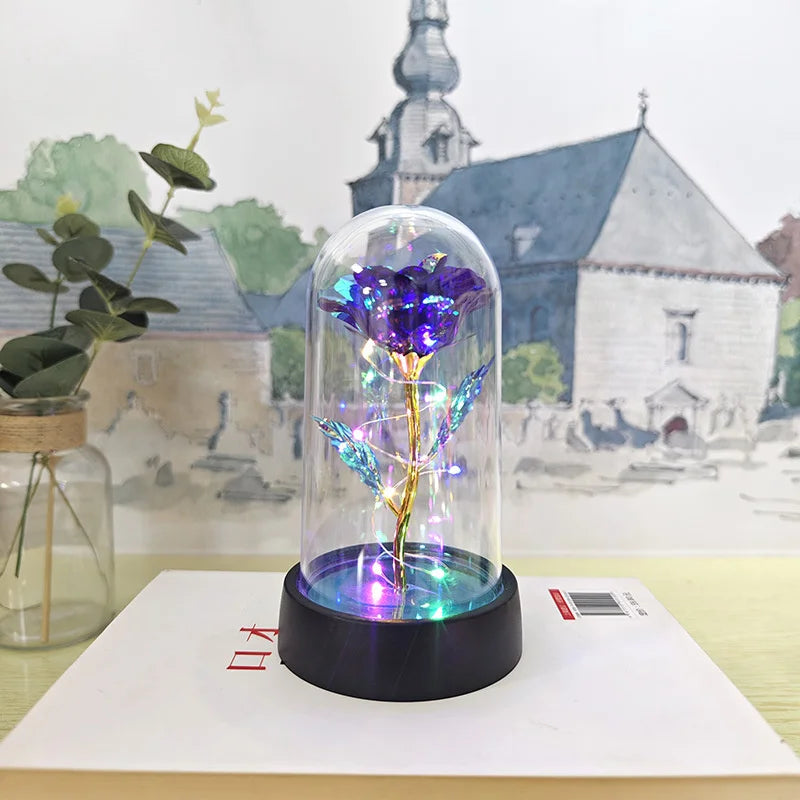lampe led rose stabilisée dorée feuilles vertes moderne nuit multicolore base noire verre transparent