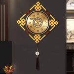 horloge murale or noir motif géométrique tissu classique tassel moderne