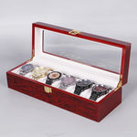 boîtes montres bois rouge foncé noir élégantes velours beige verre transparent cadenas dorés 10