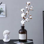 décoration intérieure bouquet coton blanc feuilles vertes tiges brunes naturel rustique mariage anniversaire festivités