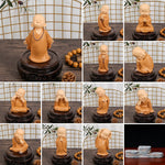 statue moine résine artisanale détails fins figuratif bracelet pomme pin orangeclair decorationintérieur