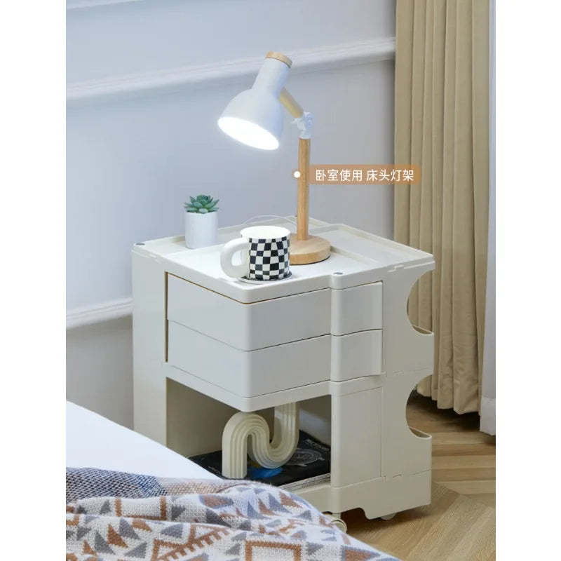 support stockage rotatif multifonction moderne plastique blanc orange vert minimaliste roulettes portatif