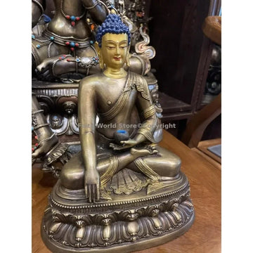 statue bouddha bronze doré traditionnelle bouddhisme détails sculptés vêtements lisses protection efficace autel culte