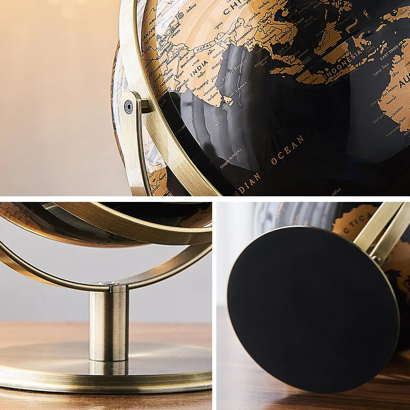 globe terrestre noir cartographie détaillée continents base anneaux métal doré ornement maison
