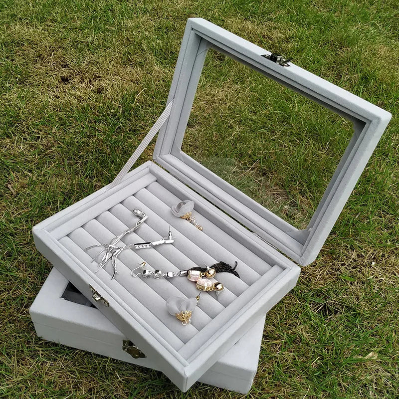 boîte bijoux velours miroir rangement bagues boucles d'oreilles poignées métal gris moderne sécurité protection