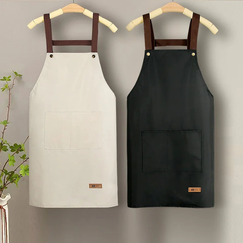 tablier cuisine toile gris foncé beige clair poche avant élégants cuir vert foncé marron