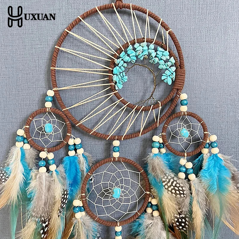 attrape rêves ethnique attrape rêves artisanal plumes bois marron bleu gris blancsuspendu fil