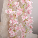 guirlande fleurs artificielles cerises rose clair décor mariage romantiqueintérieur festive
