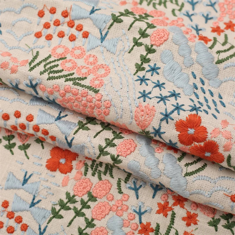 tissu brodé fleurs feuilles coton linge beige orange vert traditionnel antimicrobien respectueux environnement