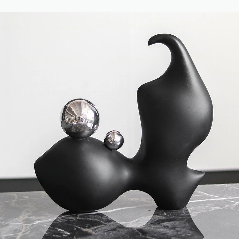sculpture abstraite moderne plusieurs parties forme organique noir mat sphères argentées