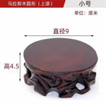support plante bois sculpté artisanal marron foncé pot fleurs décoration végétale rustic stand