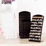 porte boucles d'oreilles moderne velours noir blanc grille perforations pieds boucles d'oreilles.storage organizer