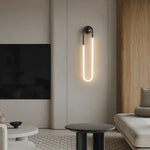 applique murale moderne minimaliste noir doré lumière blanche led fixée mur deux tubes incurvés