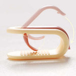 clips rangement moderne rose clair beige vert pastel violet adhésifs minimalistes pièces invisible housse
