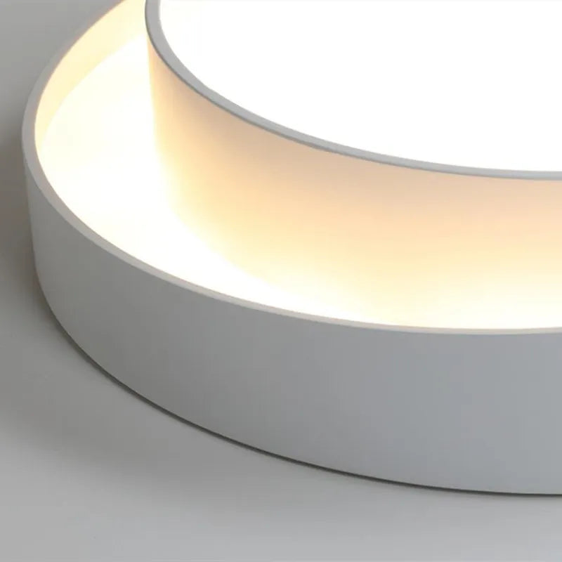 plafonnier led moderne minimaliste blanc gris rond lisse intérieur salon chambre