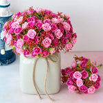 décoration intérieure rose vif fleurs artificielles bouquets champêtres vases lampion floral