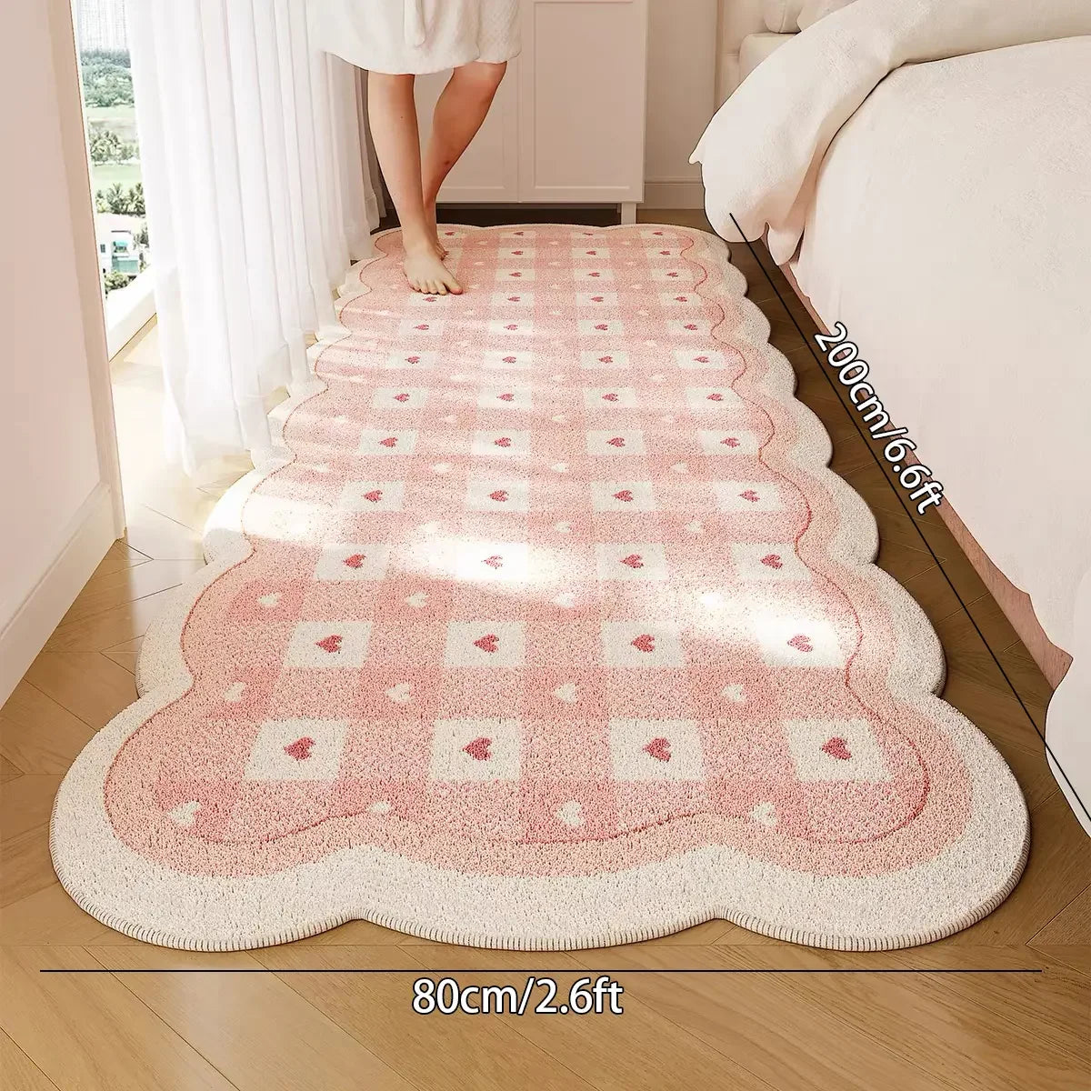 tapis moderne rose clair blanc motifs coeurs noeuds rayures bordure ondulée salon chambre enfant