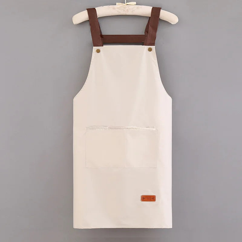 tablier cuisine imperméable bleu clair beige noir nettoyage poche avant épaulières cuir classique