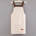 tablier cuisine imperméable bleu clair beige noir nettoyage poche avant épaulières cuir classique