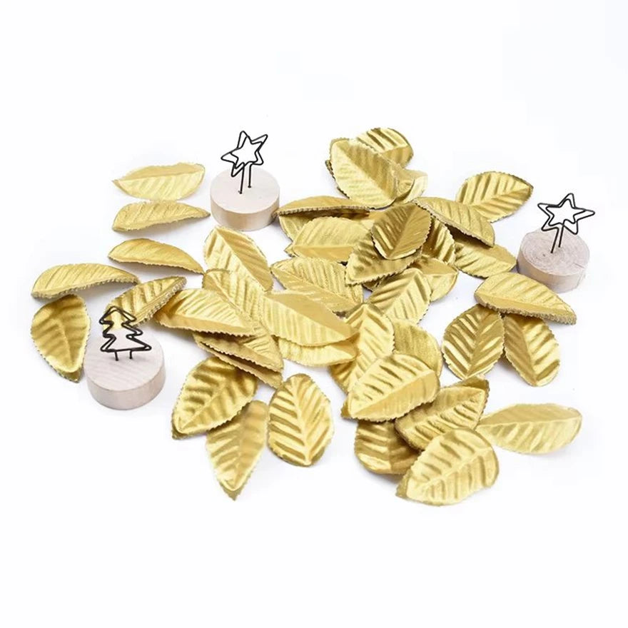 feuilles decoratives dorées rayees accessoires festifs cloche sapin boules noel