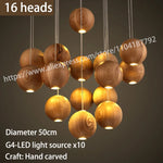 luminaire suspension bois massif moderne éclairage intérieur salon cuisine restaurant naturel