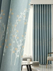 rideau occultant bleu clair motif floral moderne passe tringle dorés semi transparent Polyester