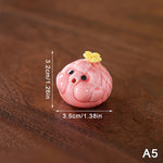 bol thé décoratif motifs fleurs pois rose blanc figurines porc céramique artisanal