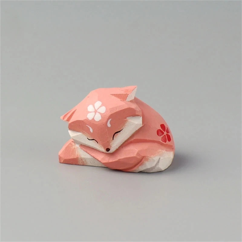 statue animale bois figurine bleu rose motif floral minimaliste yeux stylisés petite deco