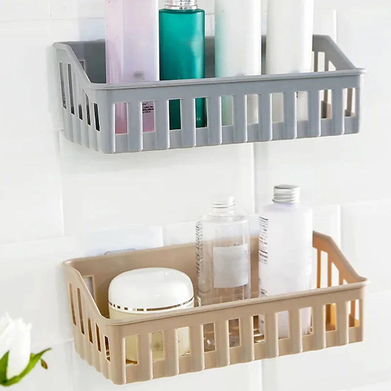 paniers rangement adhésifs salle bain gris beige modernes fonctionnels transparents perforés