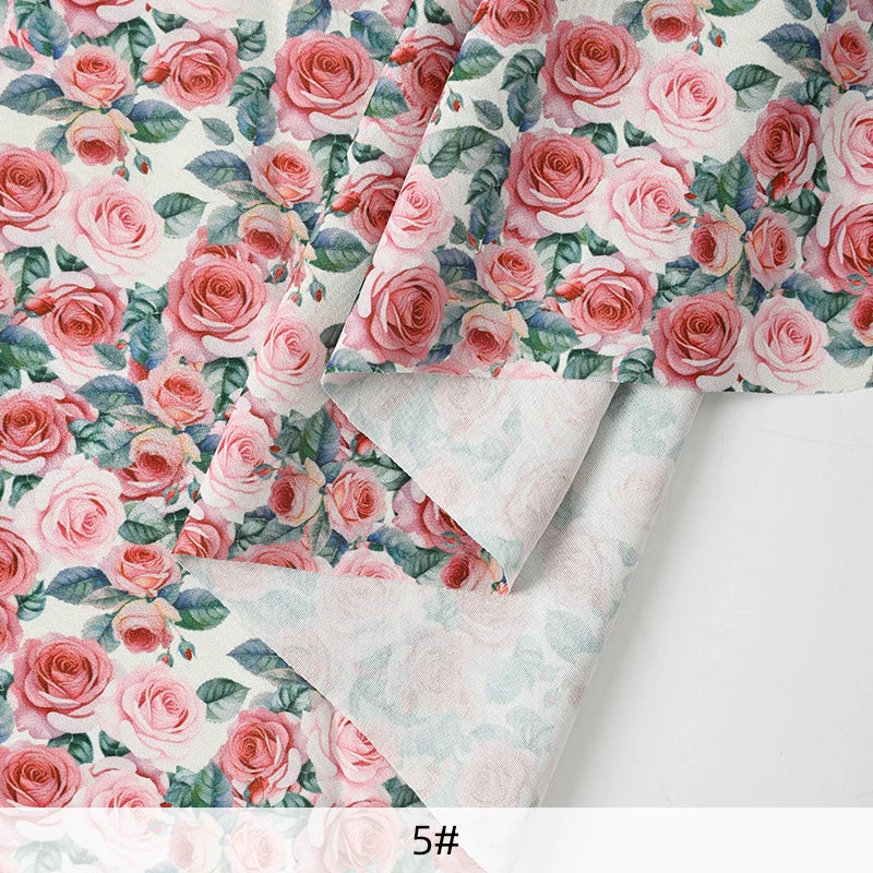 tissu mousseline polyester imprimé fleurs roses fond noir couture robe chemisier rideau diy