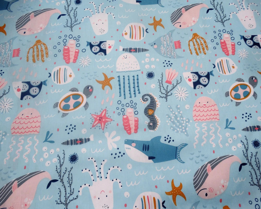 tissu coton imprimé thème marin poissons coquillages enfants blanc rose bleuclair vert