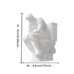 statue humoristique penseur assis toilettes blanc artistique parodie