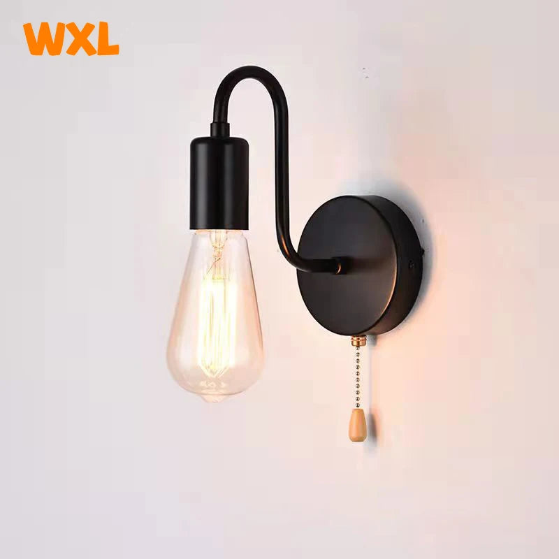 lampe murale moderne fer noir fixe 15cm largeur 18cm hauteur interrupteur ampoule