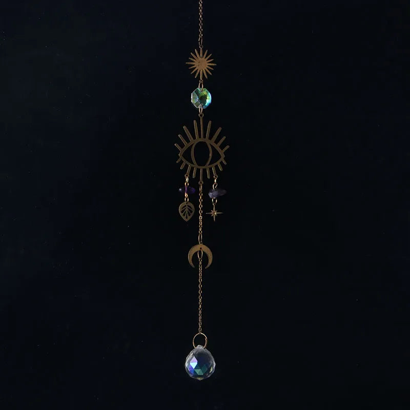 bijou pendentif cristal or bleu violet vert formes géométriques motifs oculaires translucides boho chic