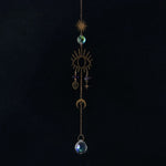bijou pendentif cristal or bleu violet vert formes géométriques motifs oculaires translucides boho chic