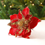 Détail des paillettes dorées de la fleur de Noël