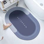 tapis bain moderne ovale motifs pas couleurs bleu marine gris clair rose violet texture