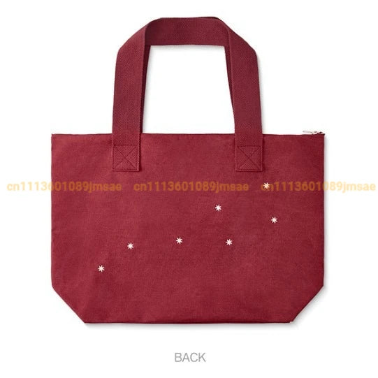 sac main rouge bordeaux étoiles blanches poche zippée poignées détachables moderne casual