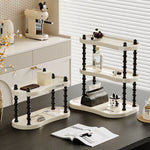 étagère trois niveaux moderne minimaliste blanc noir cosmétiques parfums tasses blancs