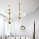 lampes suspendues modernes or blanc opalescent formes organiques sculpturales