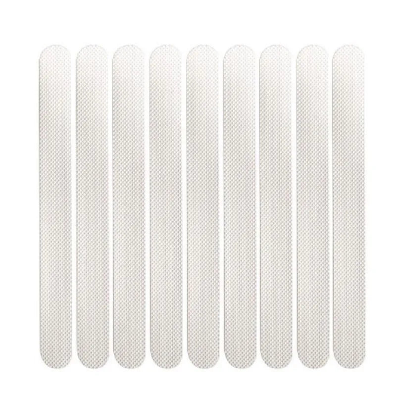 bandelettes adhésives antidérapantes blanc noir texture micro poreuse moderne adhésif respectueux environnement sécurité baignoire