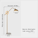 lampadaire sol moderne noir base marbre ajustable métal doré salon intérieur luxe