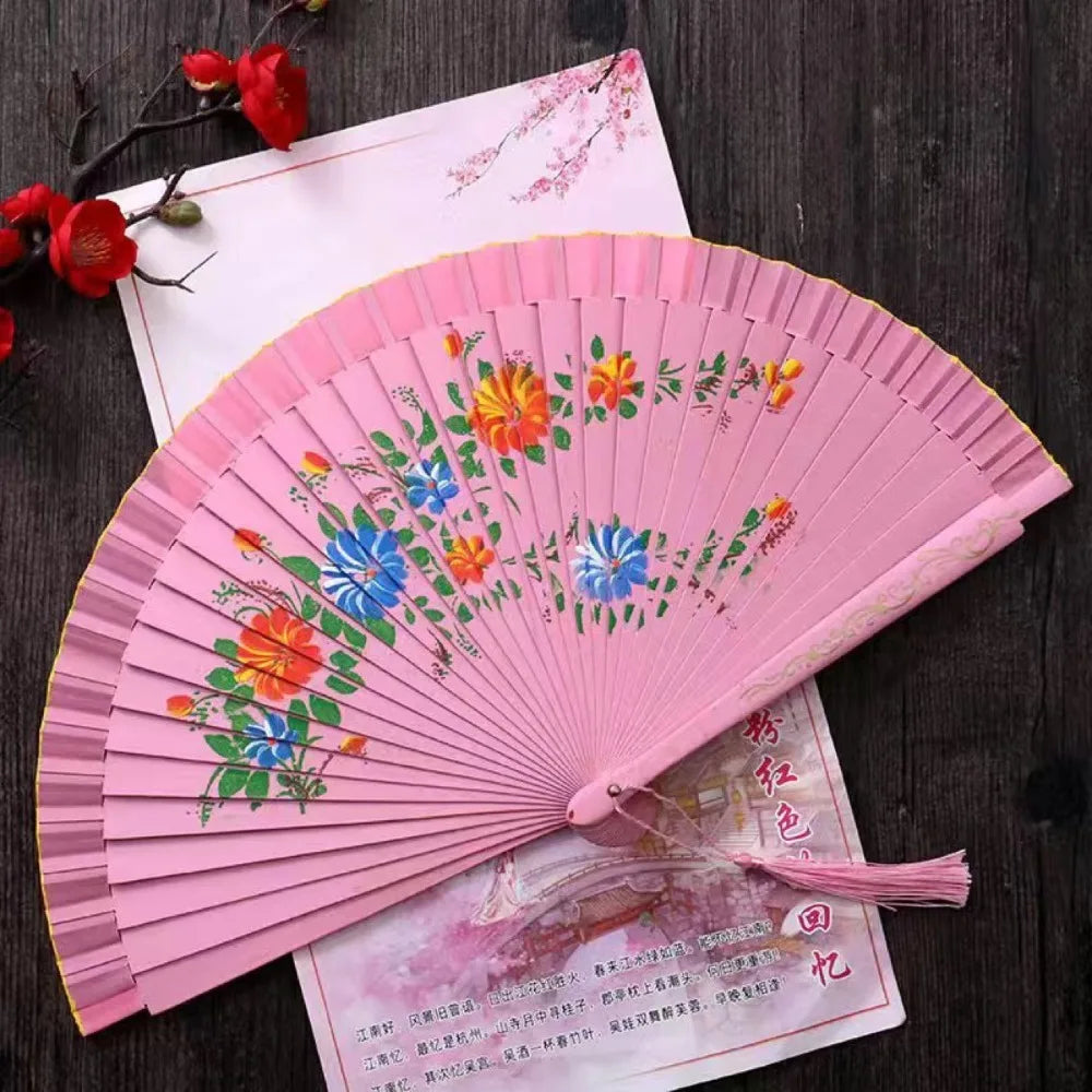 éventail pliant bois ajouré double face fleurs colorées ruban pompon rouge rose bleu vert