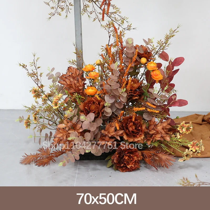 décoration événement mariage arc floral composition feuilles branches rustique automnale