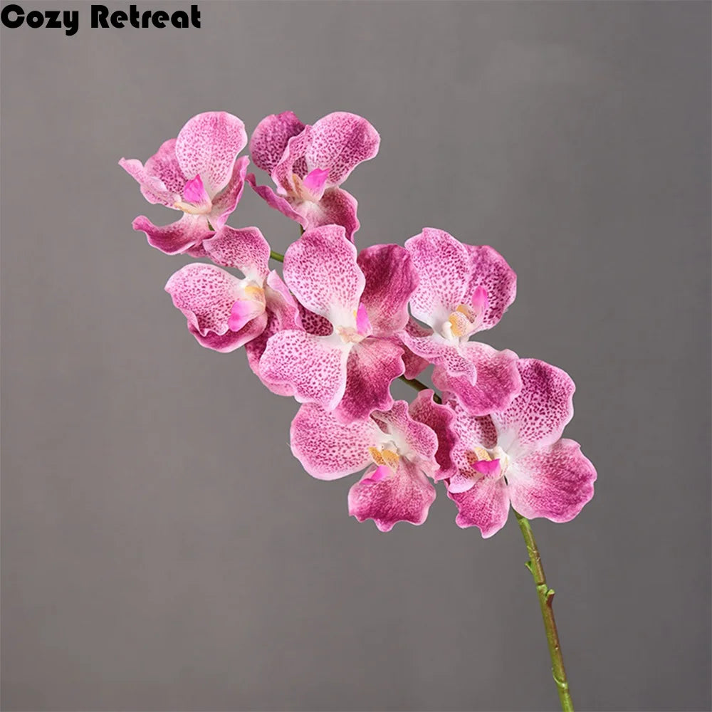 décoration intérieure moderne orchidées artificielles rose blanc rouge violet orange taches blanches vase verre
