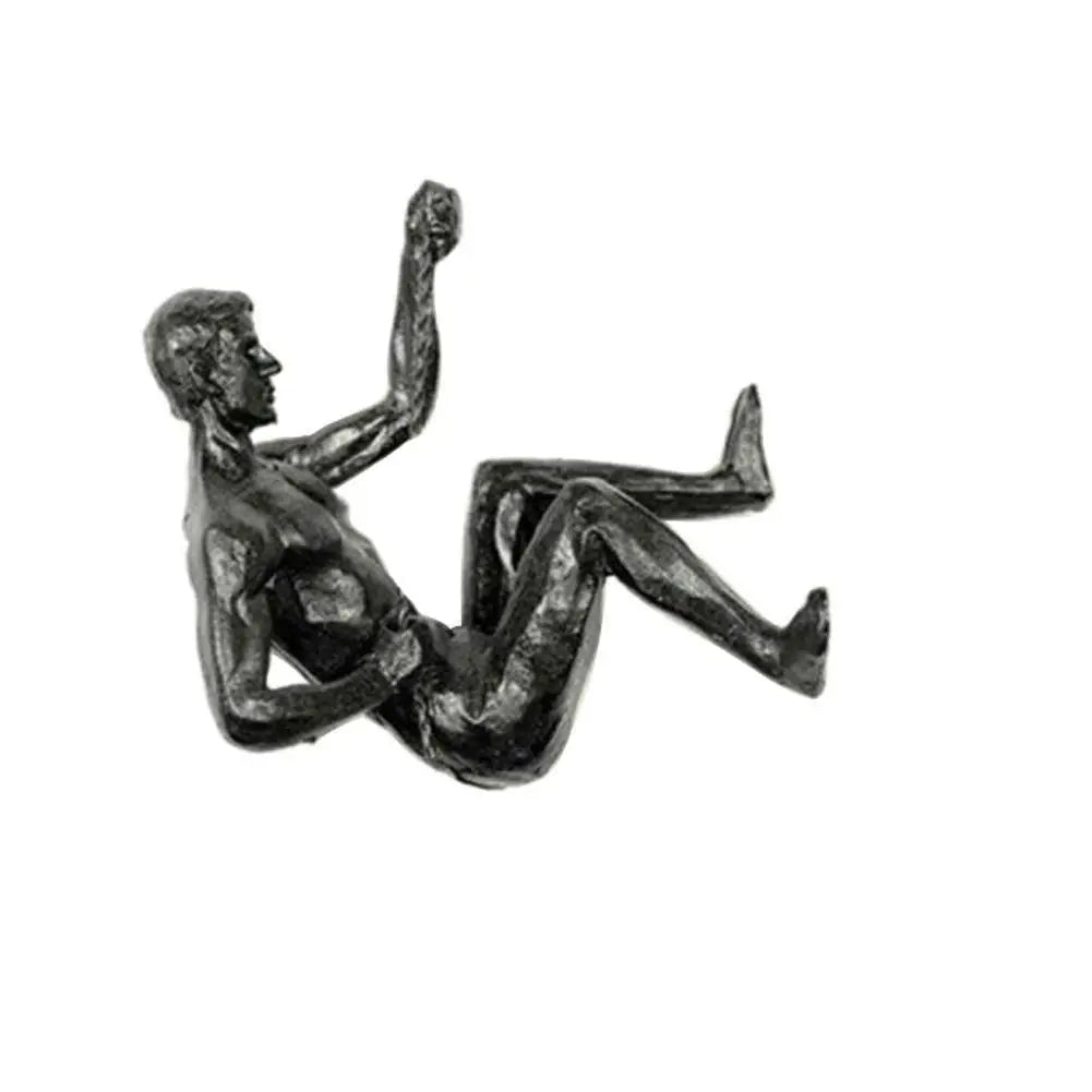 statues métal noir sculptures humaines diverses postures art moderne decoration murale