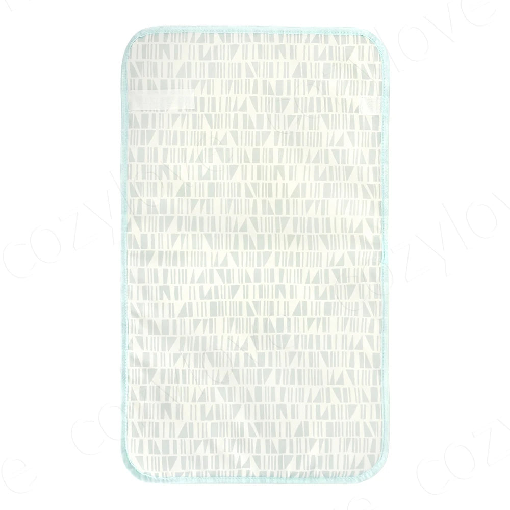 tapis changement bébé bleu marine points blancs moderne pratique imperméable réutilisable portable adhésif fixations