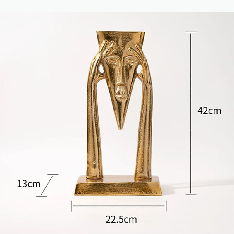 Sculpture dorée abstraite visage humain art africain vase fleurs séchées tableau texture rugueuse